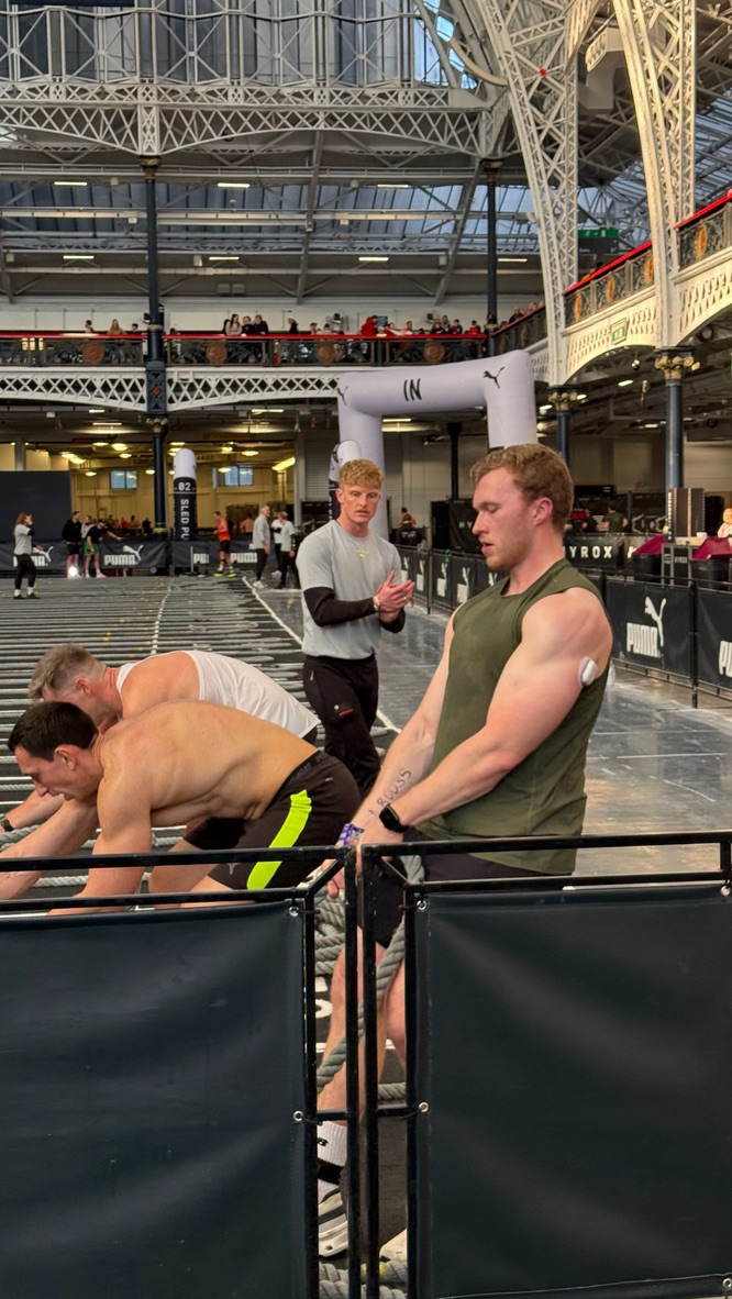 Brady coaching at a Hyrox event